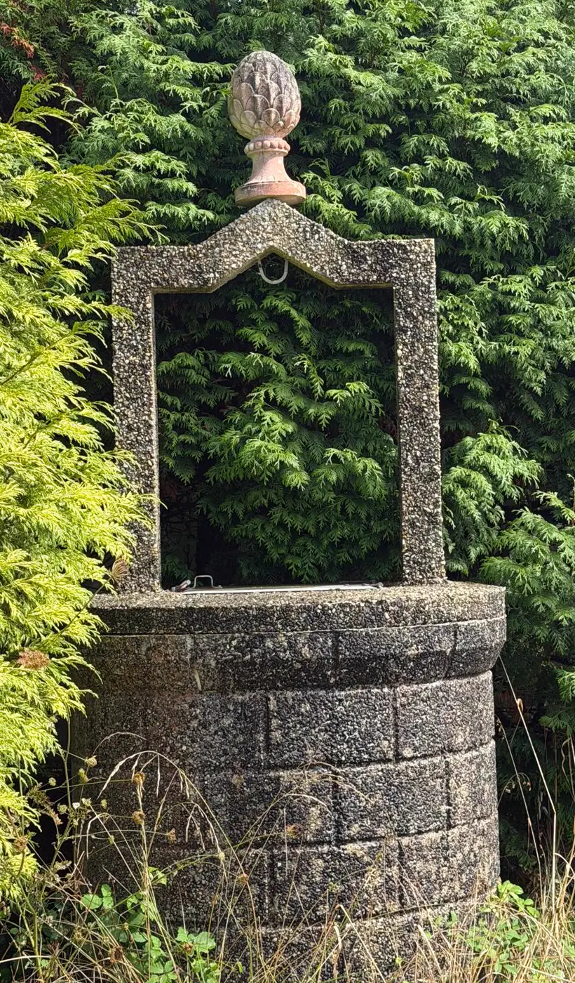 Stone well on the plot